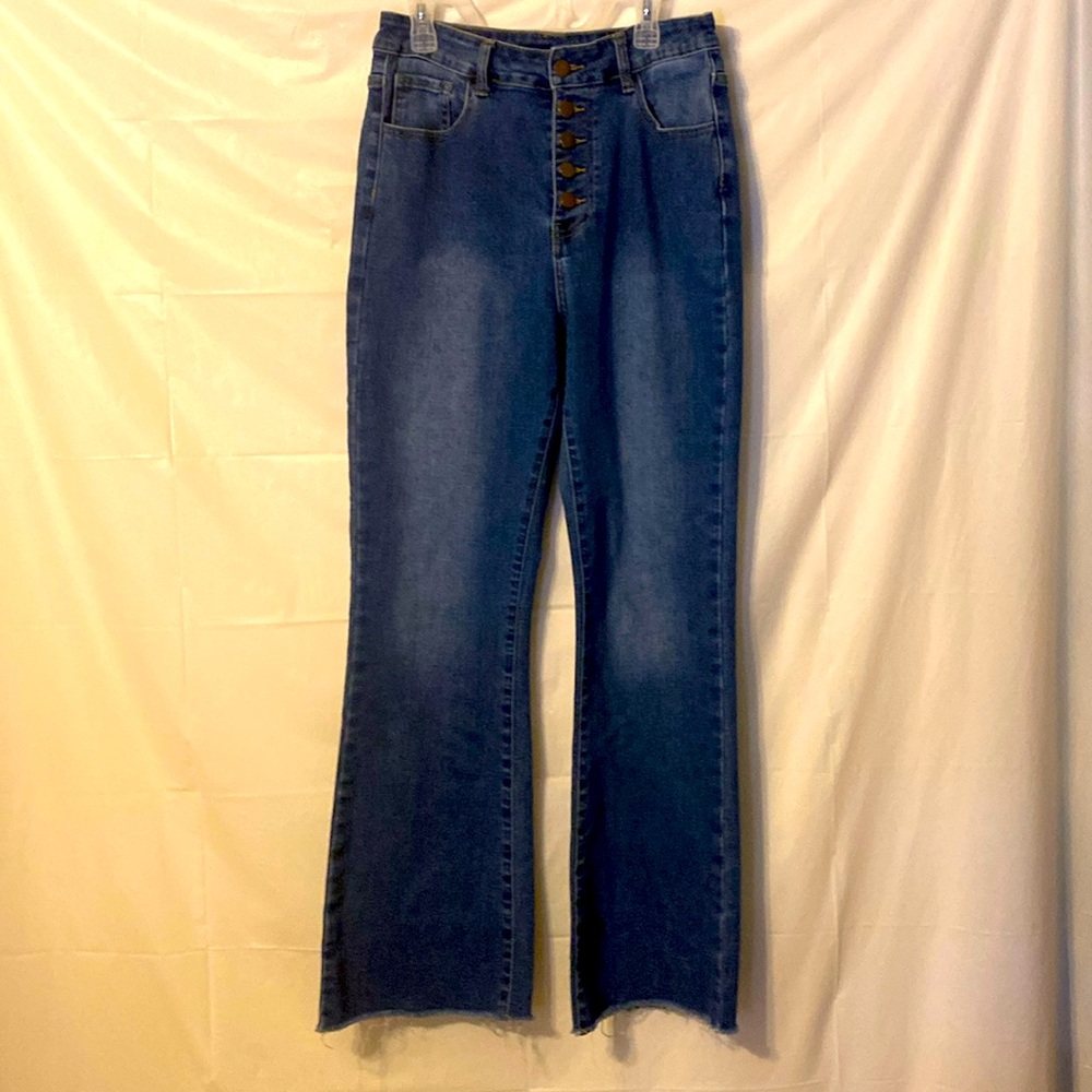 SHEIN size 8 flare leg, raw hem, high waisted blue jeans. Button up.